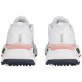 White athletic shoes are positioned upright showcasing a pink accent on the heel and a textured sole designed for traction resting on a neutral background.