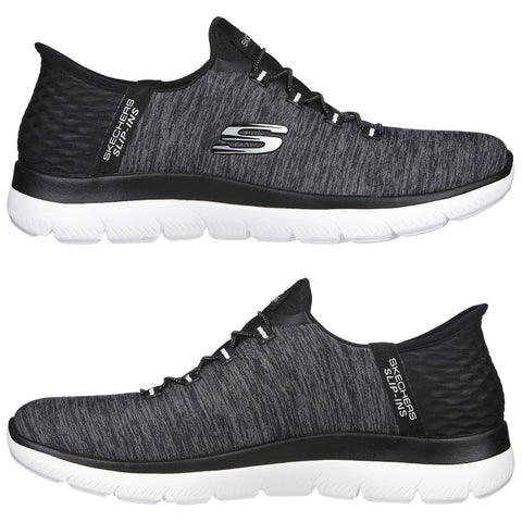 A black and gray athletic shoe features elastic laces and a cushioned sole designed for comfort and support placed against a neutral background.