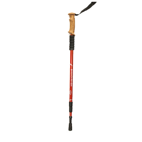 A red hiking pole stands upright on a white background featuring a textured handle and adjustable sections designed for stability and support during outdoor activities.