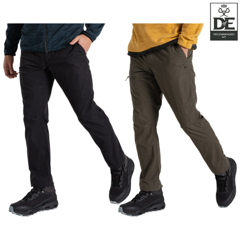 Two men stand side by side wearing different colored pants and black shoes with a prominent focus on the pants with zippered pockets showcasing a casual outdoor style.