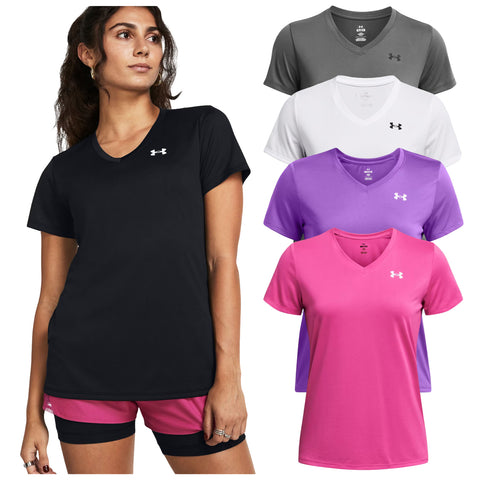 A woman stands confidently wearing a black athletic shirt and pink shorts showcasing a collection of colorful athletic shirts in gray white purple and pink arranged alongside her.