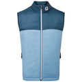 A sleeveless blue vest is displayed front-facing featuring a darker blue upper section and a lighter blue lower section with a zipper and a logo on the collar.