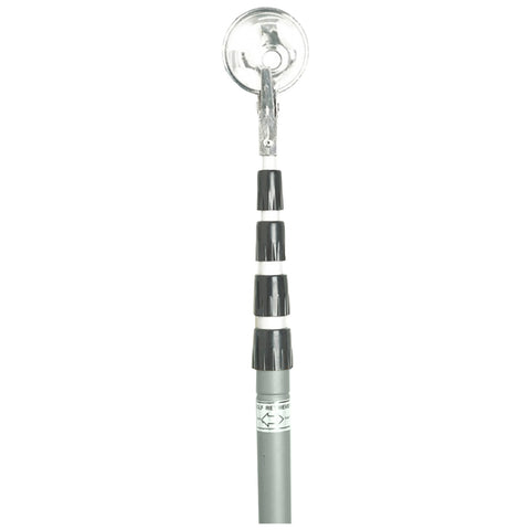 A telescoping pole with a suction cup at the top is extended vertically displaying alternating black and white sections along the shaft in a neutral background environment.