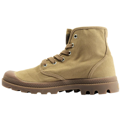 A tan high-top boot is standing upright with laces fastened and a rubber toe cap. Its textured sole suggests a focus on traction suitable for outdoor environments.