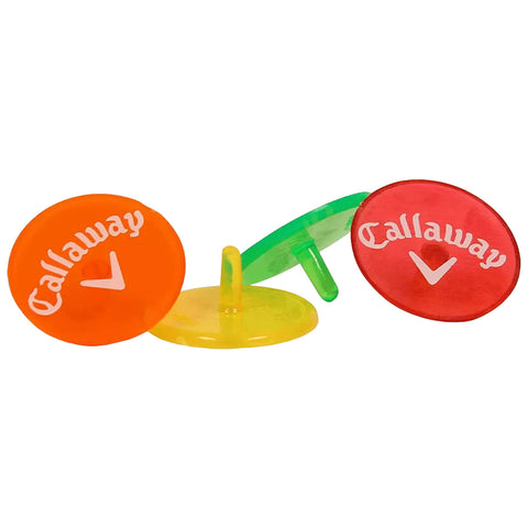 Three colorful plastic golf tees in orange yellow and green stand upright with the logo Callaway displayed prominently on the top surfaces against a plain background.