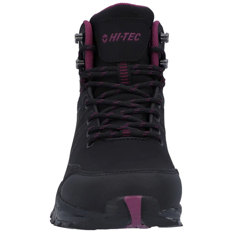 A black hiking boot with a pink accent stands upright showcasing a robust design and lacing system in a neutral background indicating functionality and outdoor use.