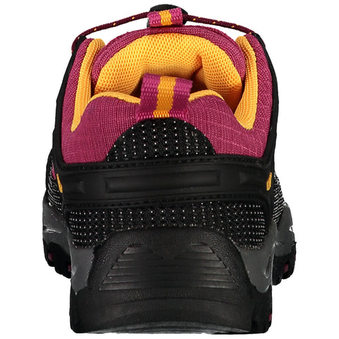 A black and purple athletic shoe is shown from the back with mesh and padded openings visible the environment features a neutral backdrop typical for product displays.