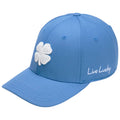 A blue baseball cap features a white embroidered four-leaf clover on the front and the text Live Lucky stitched on the side, designed for casual wear or outdoor activities.