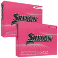 Two pink golf ball boxes from Srixon are displayed side by side. Each box features bold black text stating "SOFT FEEL LADY" with descriptions highlighting superior softness and distance for women.