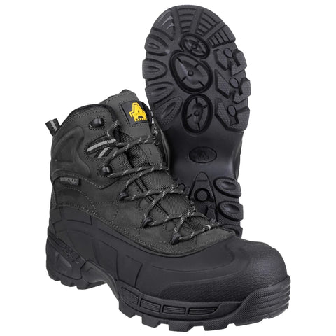 Black waterproof boots are displayed upright with one showing its textured sole. The boots are designed for outdoor activities, emphasizing durability and grip on various terrains.