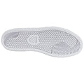 A white sneaker sole with a patterned tread design is displayed. The sole is oriented flat against a white background, emphasizing its curvature and grip features.