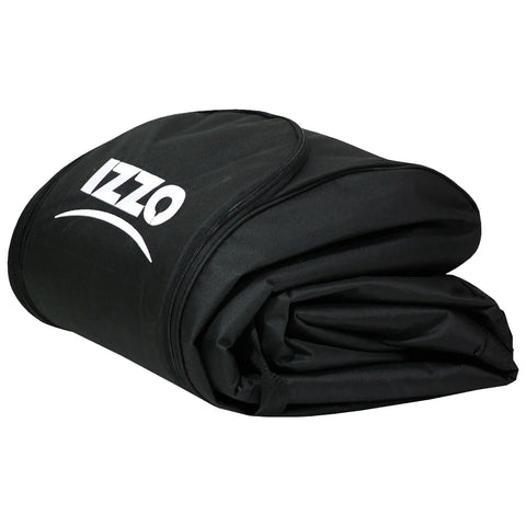 A black folding yoga mat is neatly rolled up displaying the brand name Izzo prominently on the surface it is stored in preparation for use in a fitness setting.