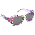 Colorful floral-patterned sunglasses rest at an angle with dark lenses highlighting their oversized design in a bright and playful aesthetic suitable for sunny outdoor environments.