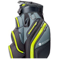 A gray and black golf bag with bright yellow accents stands upright showcasing multiple zippered pockets and a compartment for holding golf clubs in a designed environment.