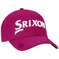 A pink cap features the white embroidered logo "Srixon" prominently displayed on the front with a rounded peak suitable for sun protection in outdoor settings like golf courses or casual outings.