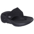 A black sandal features a wide woven strap and a toe post with a textured footbed designed for comfort and support placed against a plain white background.