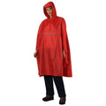 A person wearing a bright red rain poncho with a hood stands upright. The poncho has a front pocket and is paired with dark pants and boots in a neutral setting.