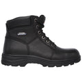 Black leather work boot stands upright displaying its textured surface and sturdy sole featuring metal eyelets for laces positioned along the front with a padded collar at the top.