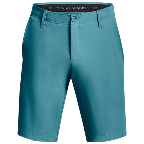 Teal shorts are displayed hanging vertically with a smooth texture and a button closure at the front showcasing the Under Armour logo on the waistband.