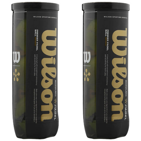 Two cylindrical containers of Wilson Premier Padel balls are displayed upright. Each container features a black and gold design with text indicating the brand and product details, emphasizing speed and durability for padel play. The context suggests a sports-related environment.