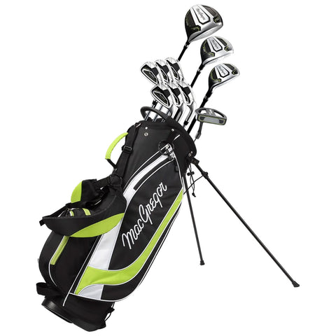 A golf bag stands upright displaying multiple clubs sticking out from the top the bag is black with white and green accents and includes a shoulder strap for carrying