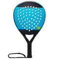 A padel racket with a blue and black design features numerous perforations on the hitting surface. The handle is wrapped for grip and includes a wrist strap for security during play.