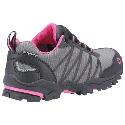 A gray and pink waterproof shoe is positioned at an angle displaying its textured fabric upper and rugged sole highlighting its suitability for outdoor activities.