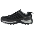 A black athletic shoe designed for outdoor activities features a textured upper with mesh and suede materials it is positioned on a plain background suggesting readiness for hiking or sports