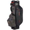 A golf bag stands upright featuring multiple zipped pockets and a sleek design. It is primarily black with red accents and compartments for organizing golf equipment.