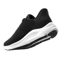 A black athletic shoe with a sleek design is displayed at an angle showcasing its textured upper and contrasting white sole while emphasizing its modern style suitable for sports or casual wear.