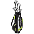 A golf bag stands upright holding several clubs upright inside it while resting on a flat surface with a black and white design and green accents featuring the name MacGregor prominently displayed.