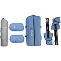 A set of camping gear includes a large blue storage bag and two inflatable items alongside a gray bag. The context suggests preparation for outdoor activities or camping.