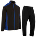 A black and blue sports jacket stands beside matching black pants showcasing a modern design with pockets and a zip closure intended for activewear in casual outdoor settings.