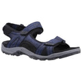 A blue sandal is displayed standing upright with adjustable straps showcasing a comfortable design suitable for outdoor activities in a neutral setting.