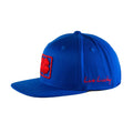 A blue baseball cap features a red embroidered four-leaf clover in a square and the phrase Live Lucky stitched in red on the side, showcasing a casual fashion accessory.