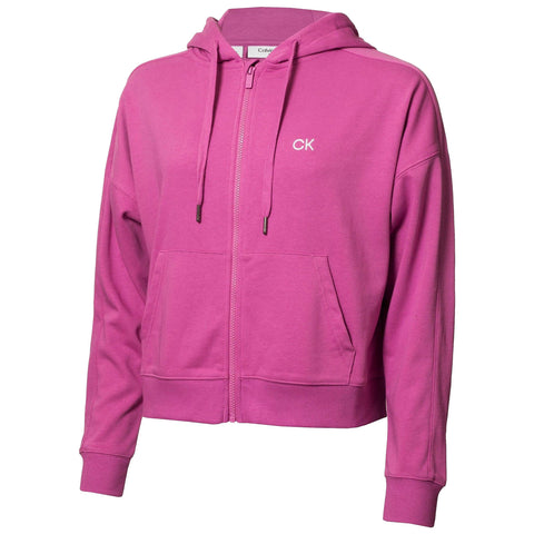 A bright pink zip-up hoodie is displayed with a front pocket and drawstrings on the hood providing a casual comfortable look suitable for relaxed environments. The logo CK is visible on the chest.