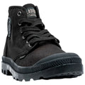 A black high-top sneaker is positioned upright with laces tied and a logo on the side showcasing a rugged rubber sole suitable for outdoor activities.