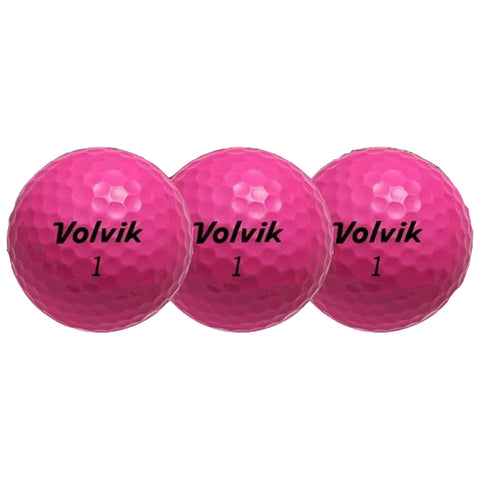 Three pink golf balls are positioned in a row showcasing the brand name Volvik and the number one on their surfaces, implying they are ready for use in a golf game.