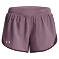 Shorts in a soft mauve color feature an elastic waistband and a loose fit with side mesh accents for breathability designed for athletic activities or casual wear.