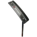 A black golf putter with a curved head labeled Odyssey and model Three rests upright while showcasing its sleek design and tungsten-loaded features in a neutral background.