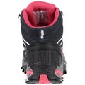 A black and pink hiking boot stands upright showcasing its rugged sole and mesh construction The interior has a padded ankle collar for comfort with a label visible inside