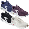 Four pairs of athletic shoes are displayed in different colors: navy blue, dark purple, black, and cream. Each shoe features a prominent white logo and a cushioned sole designed for comfort.