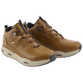 Brown hiking shoes are displayed upright with textured leather material and a rubber sole designed for traction they are positioned against a plain white background