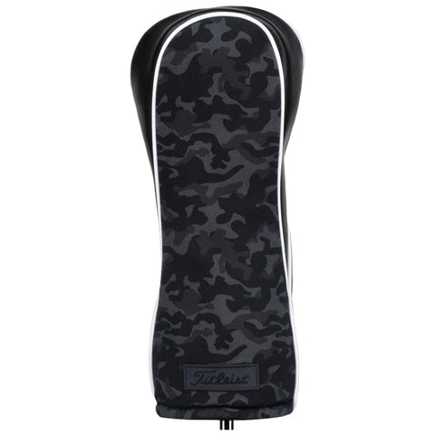 A black and grey camo golf club headcover stands upright displaying its protective design and branding logo at the bottom with a simple and functional appearance ideal for preserving club condition.