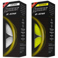 Two golf ball boxes are displayed side by side featuring the Srixon Z-Star logo with one box in pure white and the other in tour yellow. Each box highlights the ball's performance attributes like distance and spin.