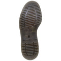 A rubber sole is displayed with a textured tread pattern designed for grip the underside shows markings for resistance to petroleum and other chemicals situated on a neutral background.