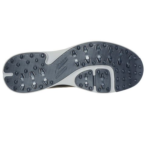 A shoe sole is displayed showing textured surfaces and studs designed for traction while providing details of a curved profile indicating ergonomic design suitable for athletic use.