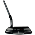 A golf putter with a sleek black design featuring the name "Odyssey" and "Tri-Hot 5K" is displayed standing upright against a plain background, showcasing its flat face and stainless steel shaft.