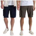 Two pairs of cargo shorts are displayed side by side. One is dark navy while the other is olive green. Both feature side pockets and are worn by a person in white sneakers.