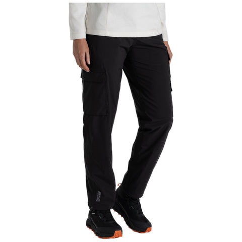 Black cargo pants are worn by a person standing upright wearing black hiking boots and a white long-sleeve top in a neutral background suitable for outdoor activities.